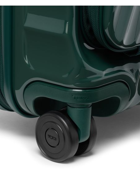 Valise cabine extensible 55 cm TUMI 19 Degree Front Access Deep Pine, détail d’une roue double et de son logement