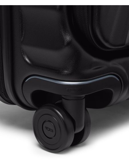 Valise cabine large extensible 55 cm TUMI 19 Degree Front Access Black Texture, détail d’une roue double et de son logement