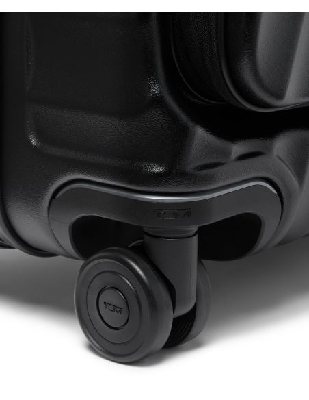 Valise soute extensible 76 cm TUMI 19 Degree Front Access Black Texture, détail d’une roue double et de son logement