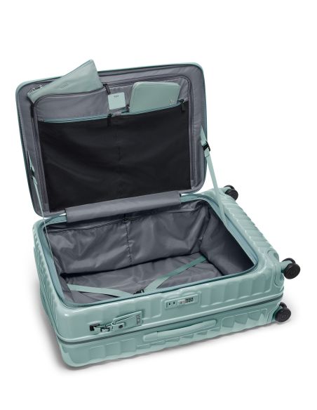 Valise soute extensible 76 cm TUMI 19 Degree Front Access Thyme, intérieur ouvert avec objets présentés dans les poches
