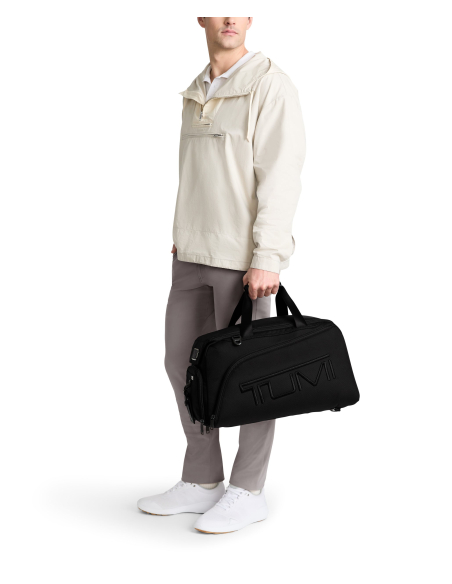 Sac de golf convertible TUMI Alpha Black, porté à la main