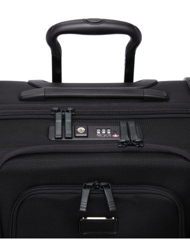Valise cabine large extensible 55cm TUMI Alpha Black, détail des serrures TSA et de la poignée