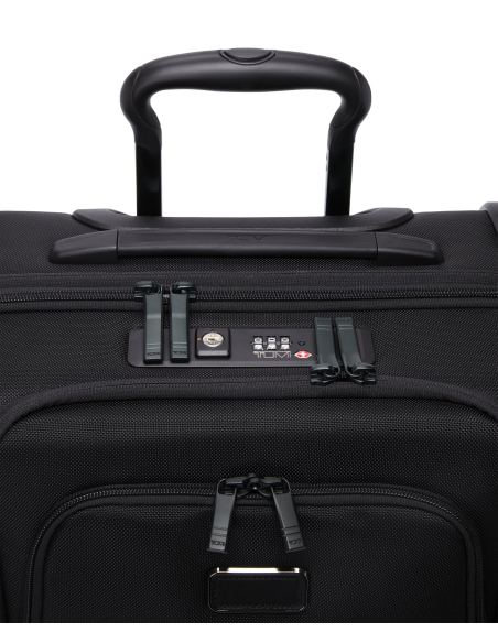 Valise cabine large extensible 55cm TUMI Alpha Black, détail des serrures TSA et de la poignée