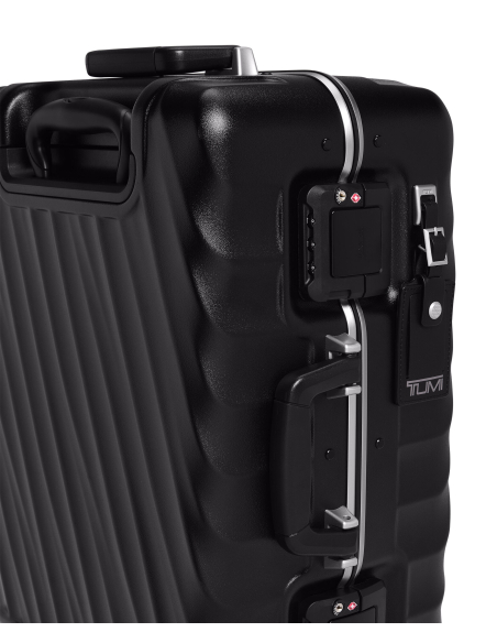 Valise cabine 55 cm TUMI 19 Degree Frame Black Texture, détail des fermoirs TSA et de la poignée latérale
