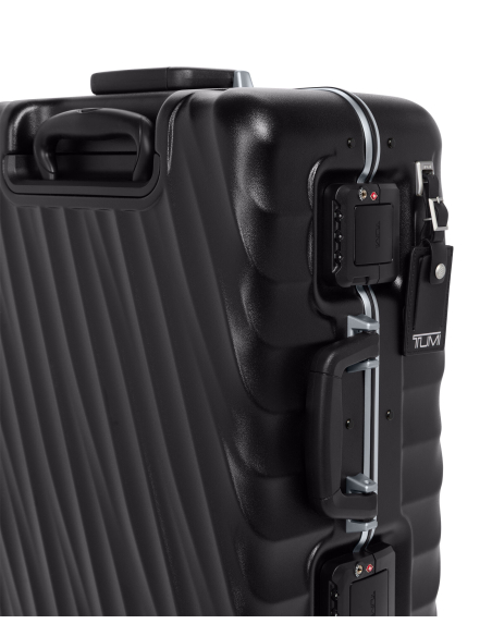 Valise cabine large 55 cm TUMI 19 Degree Frame Black Texture, détail des fermoirs TSA et de la poignée latérale