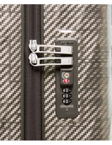 Valise cabine 55 cm TUMI 19 Degree Lite Titanium, détail de la serrure TSA et des tirettes de fermeture