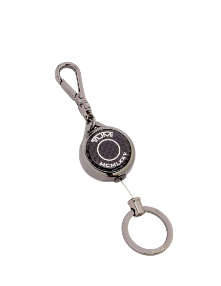 Porte-clés rétractable TUMI Carbon, boîtier circulaire et crochet de fixation