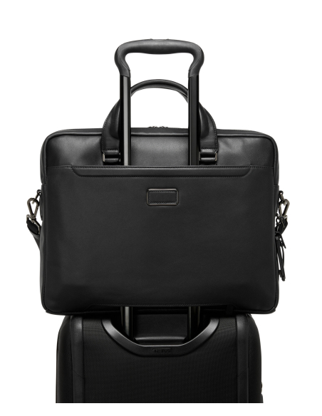 Porte-documents TUMI Harrison Avondale cuir Black Bombe, fixation sur une poignée de valise