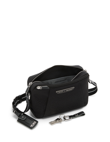 Sac bandoulière Valance TUMI McLaren Night Galaxy, compartiment principal ouvert et attache-clés