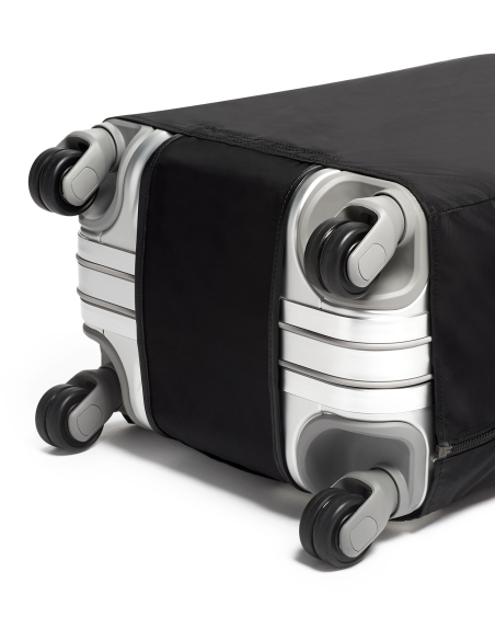 Housse International extensible TUMI Black, fermeture sous la valise et roues dégagées