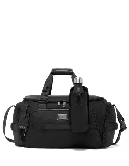 Pochette pliable Modular TUMI Black, poche déployée fixée à un sac de voyage