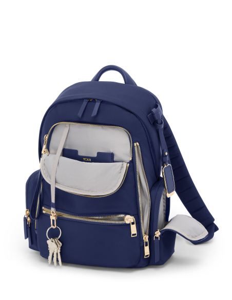 Sac à dos Medium Celina TUMI Indigo/Light Gold, poche avant ouverte et attache-clés