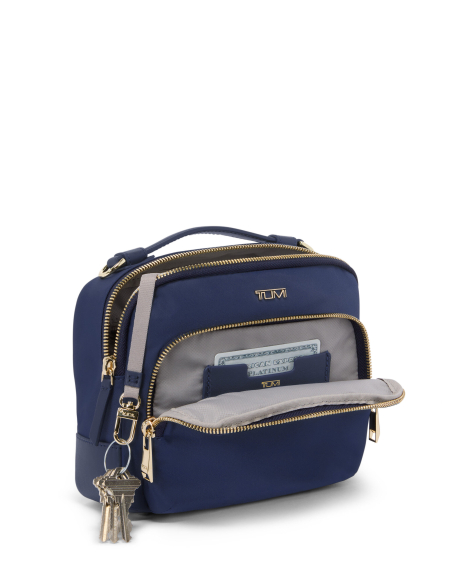 Sac bandoulière Teghan nylon TUMI Indigo/Light Gold, poche frontale ouverte avec attache-clés
