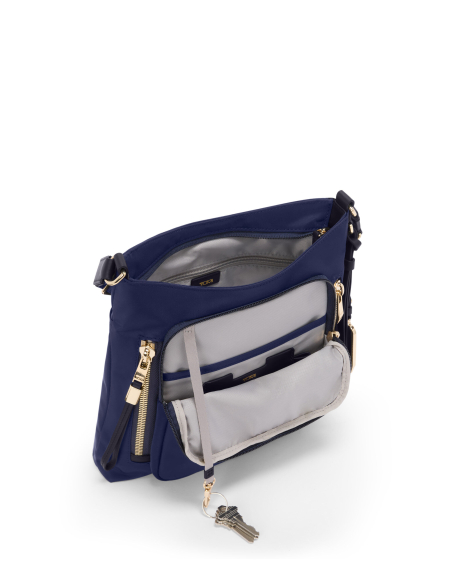Sac bandoulière Tyler nylon TUMI Indigo/Light Gold, poche frontale ouverte avec attache-clés