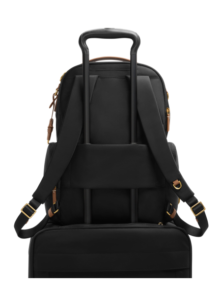 Sac à dos Celina Année du Cheval TUMI Voyageur Black/Bridle, vue arrière, passant placé sur une valise