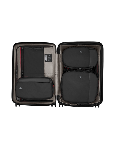 Set de 3 organiseurs Victorinox Travel Essentials Noir, trois pochettes placées dans une valise