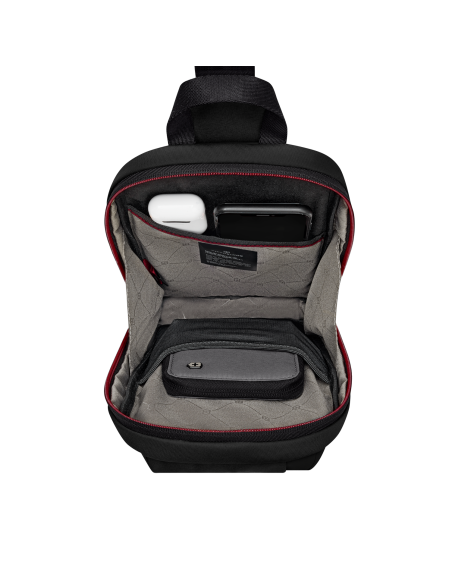 Sac Sling Victorinox Travel Essentials Noir, sac ouvert avec petits accessoires