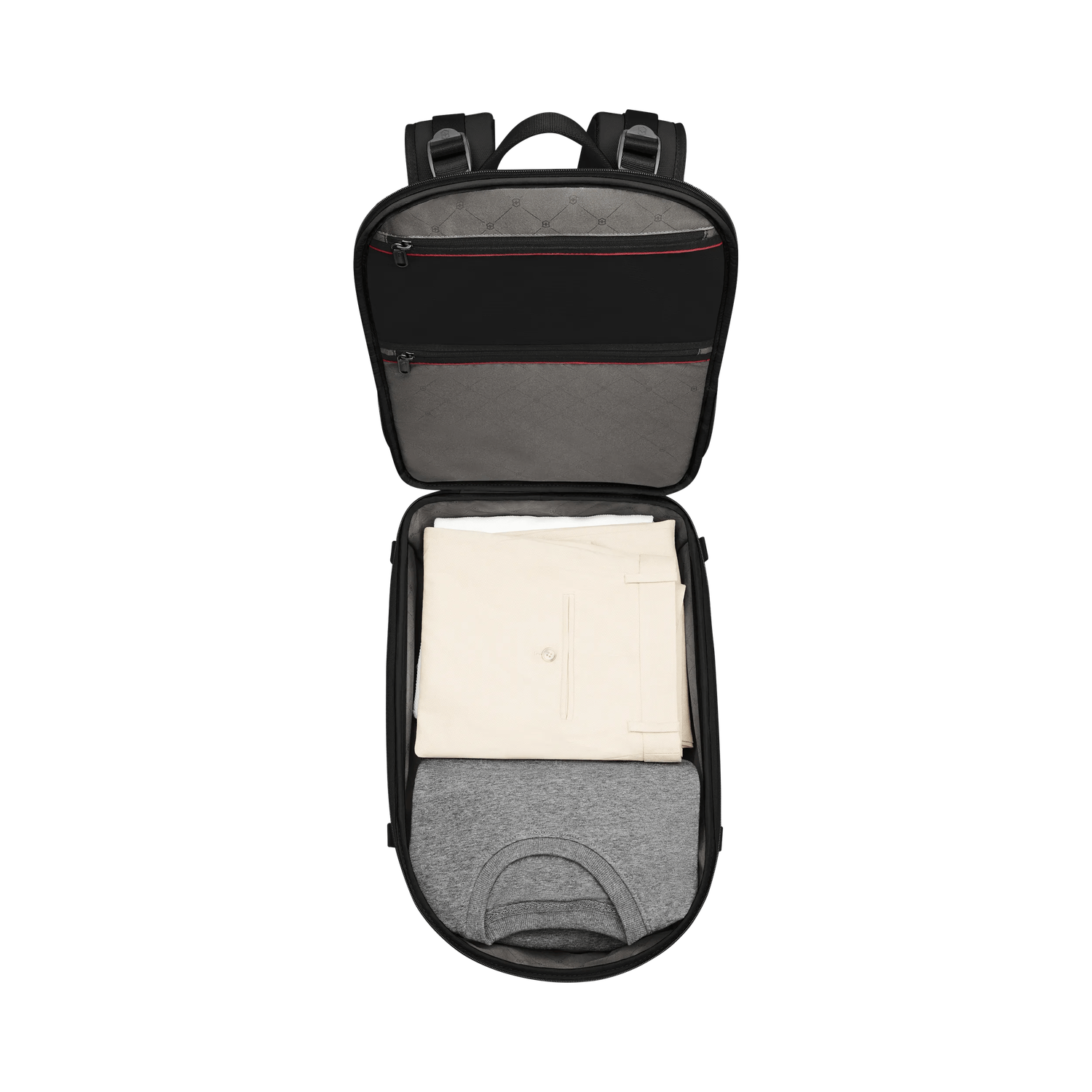 Compartiment de voyage du sac à dos Traveler Altmont Modern ouvert avec des vêtements
