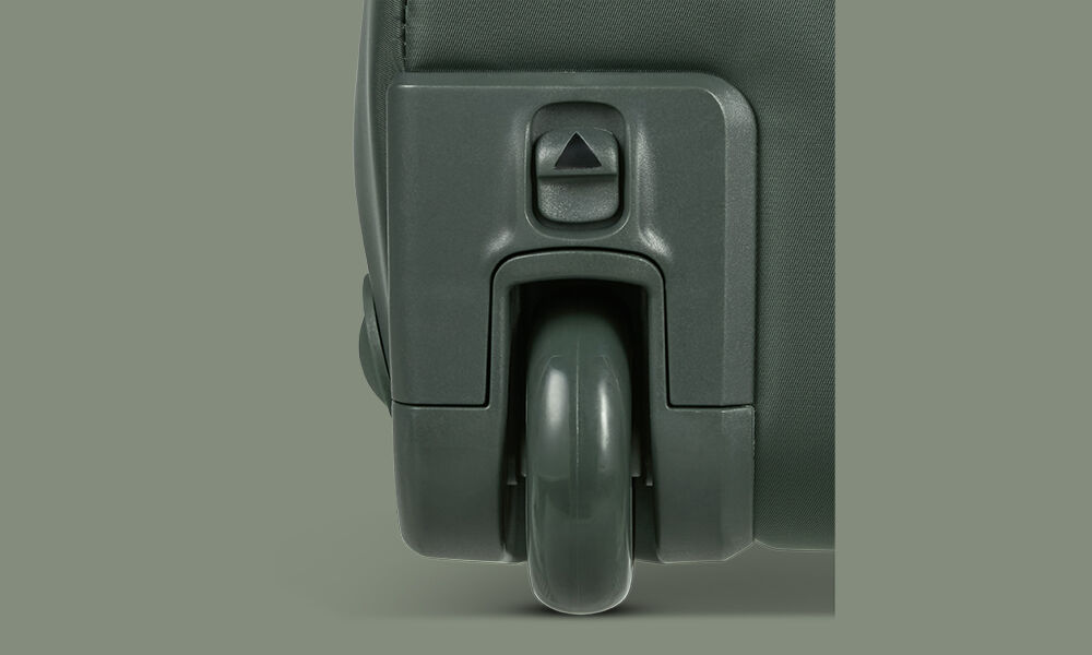 Roue et bouton de pliage d'un bagage Lipault Foldable Plume
