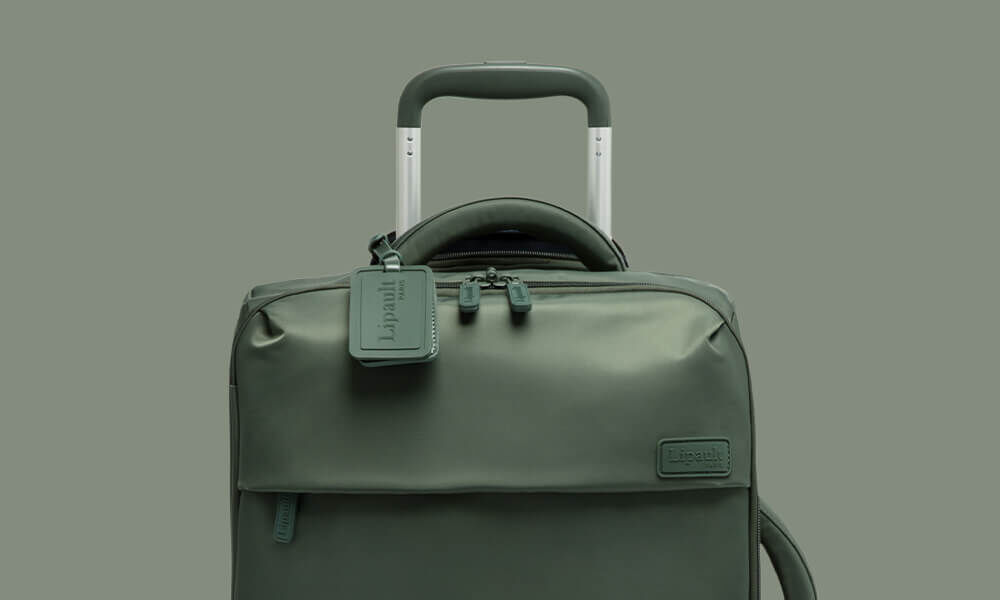 Poignée haute rembourrée et poignée télescopique de la valise Lipault Plume