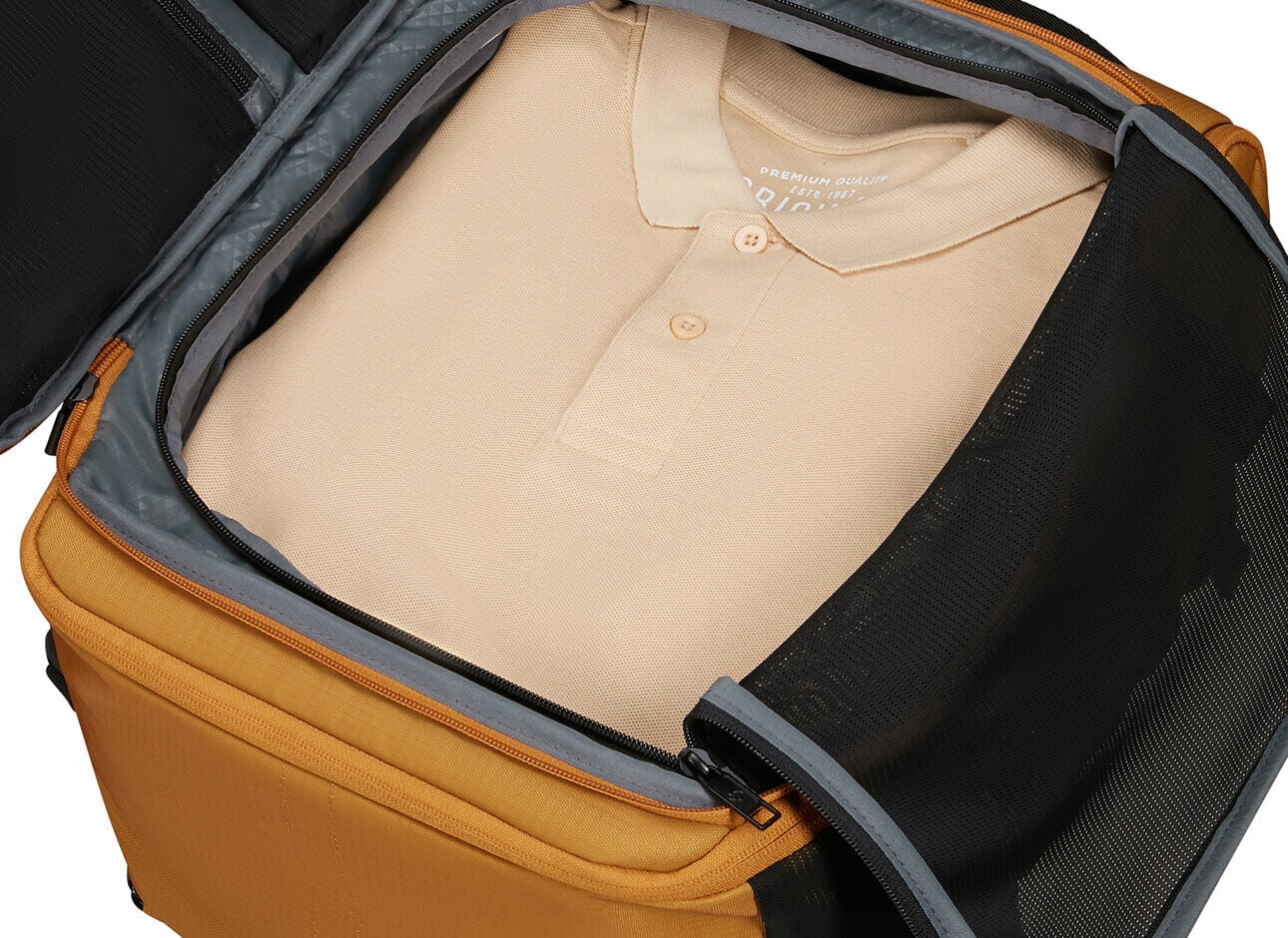 Compartiment v&ecirc;tements du Samsonite 2FIT ouvert, s&eacute;parateur et tenue rang&eacute;e &agrave; plat