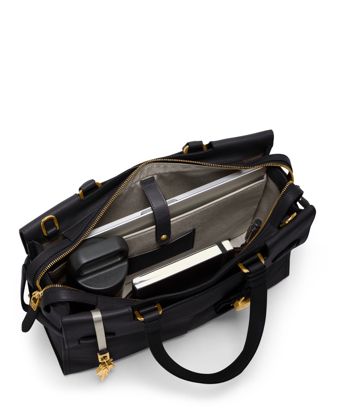 Cabas TUMI Agent Medium ouvert avec ordinateur et accessoires en situation