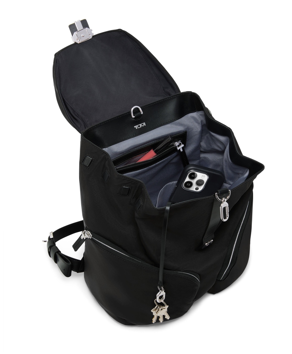 Sac à dos Medium Journey ouvert avec téléphone, clés et accessoires dans les rangements