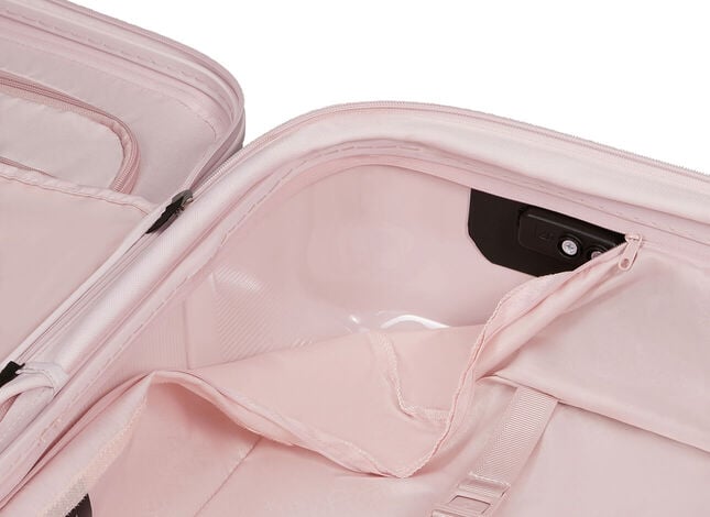 Doublure rose de la valise Samsonite Image partiellement détachée pour montrer son retrait.