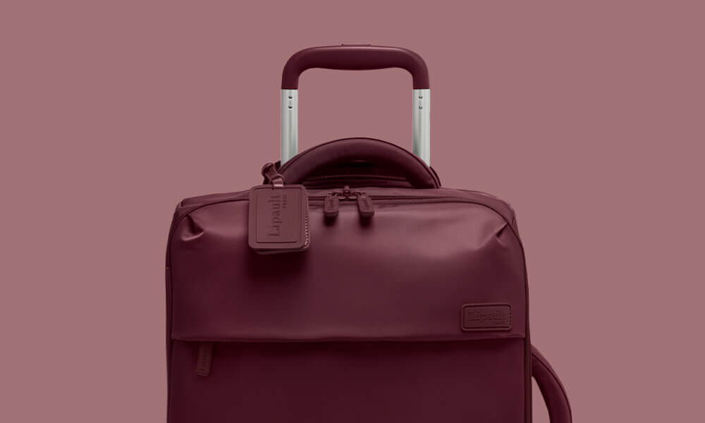 Poign&eacute;e haute et poign&eacute;e t&eacute;lescopique de la valise Lipault Plume Bordeaux