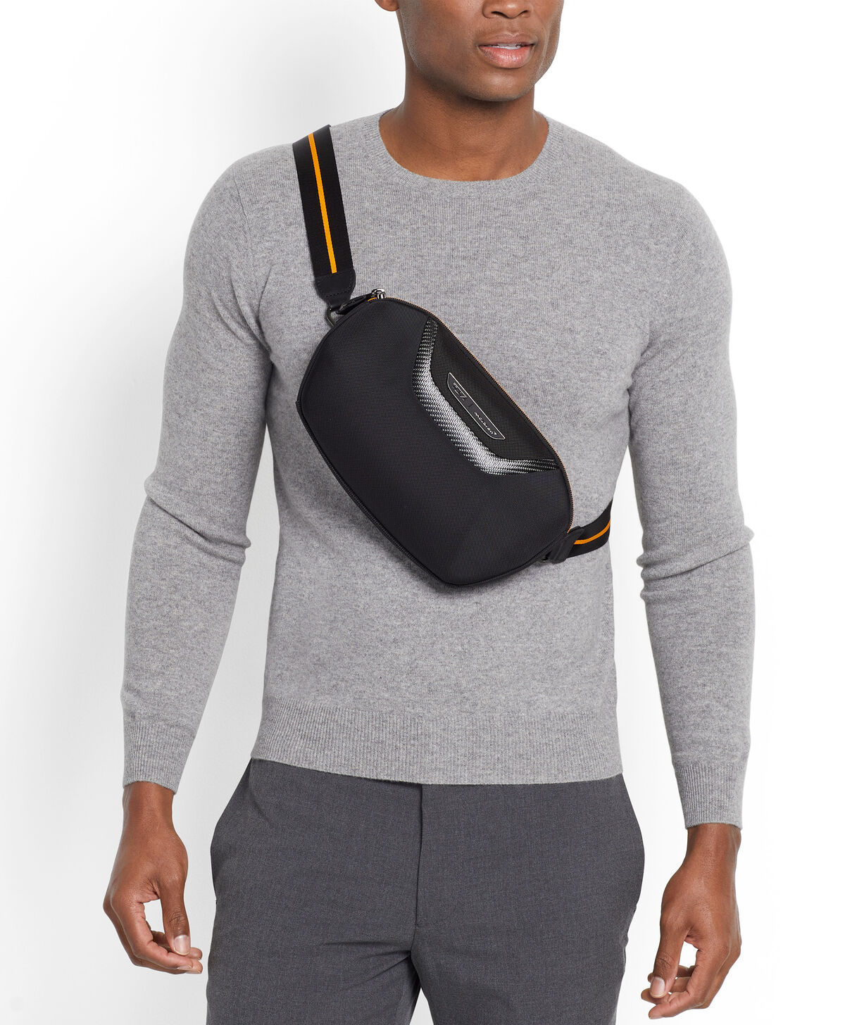 Pochette TUMI McLaren Lumin à face moulée portée croisée