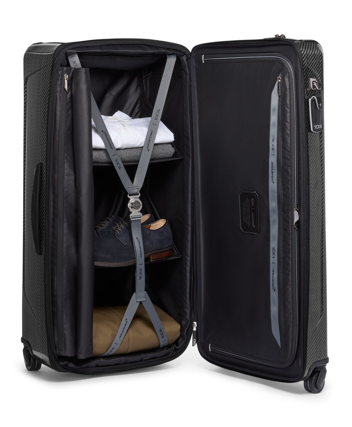 Trunk TUMI McLaren Aero XL ouvert avec s&eacute;parateurs et sangles